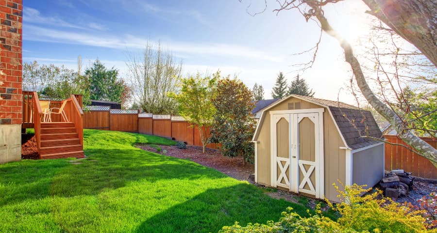 Fenced backyard with storage shed in Augusta